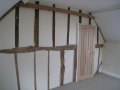 Master bedroom with exposed original timberwork